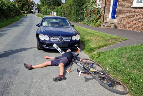 Owen larking outside the Pipe & Glass Inn